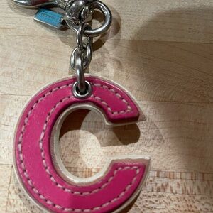 Coach letter accessory